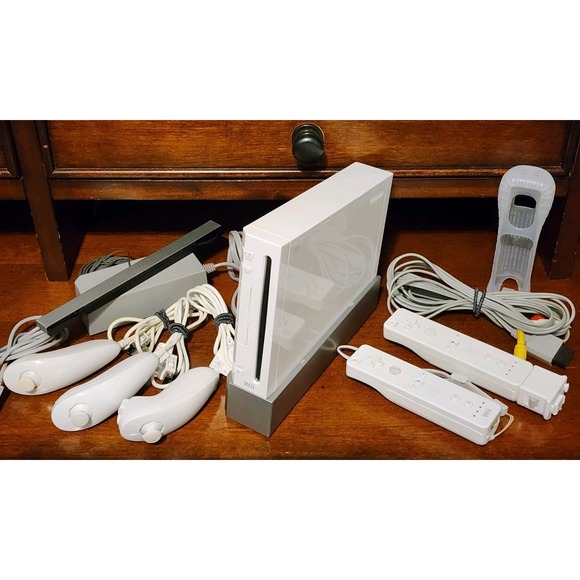 Nintendo Other - Nintendo Wii Console, Stand, 2 Controllers, 3 Nunchucks, Cords And Works Great!